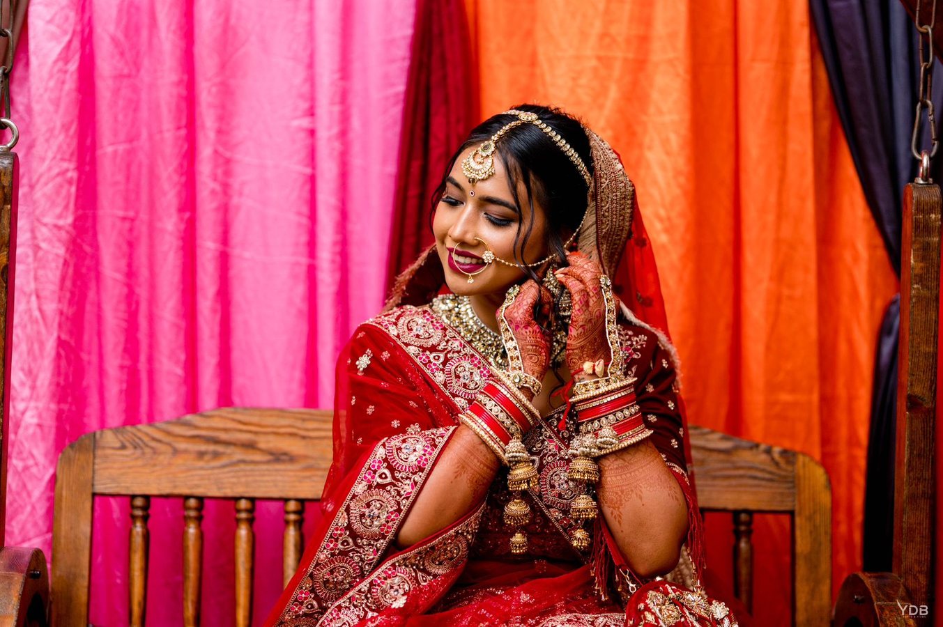 Red Lehenga — Colourful Backdrop